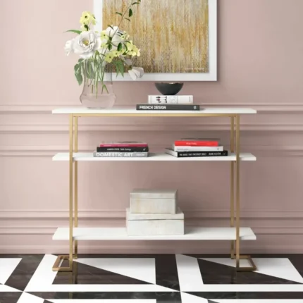 calix – golden metallic frame console table with geometric legs