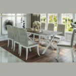 Woozod Cross modern dining table set with grey tabletop and white Fuze chairs.