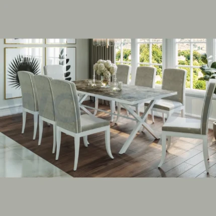 Woozod Cross modern dining table set with grey tabletop and white Fuze chairs.