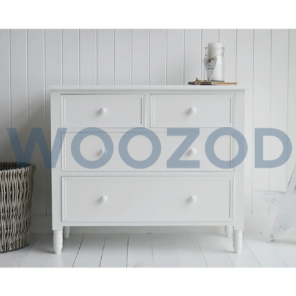 White mid-century chest of drawers with four drawers by Woozod Furniture.