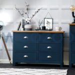 Woozod CAROL Blue Chest of Drawers with silver cup handles, smooth rounded corners, and contrasting oak brown top shelf.